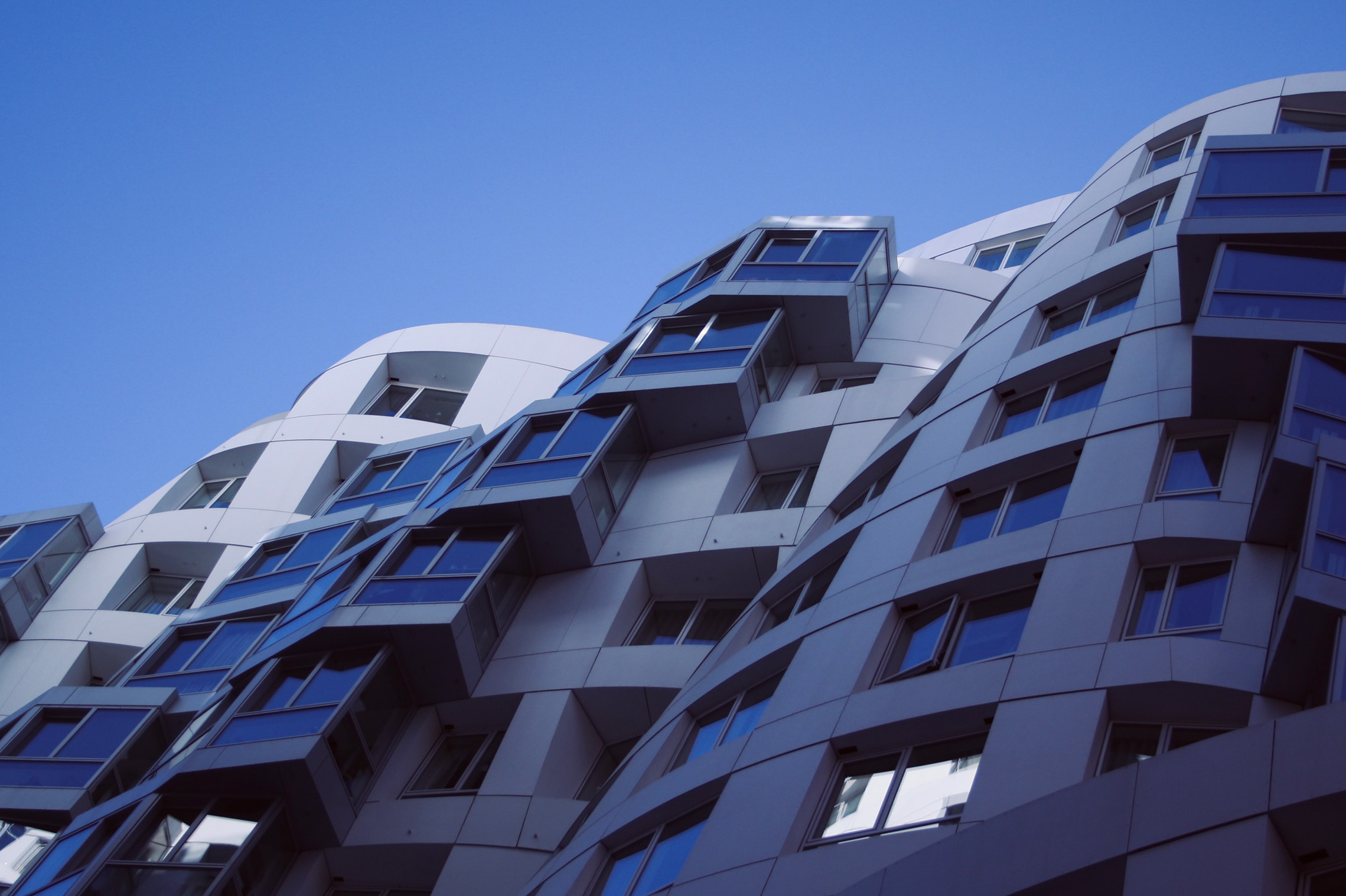Curved glass balcony building