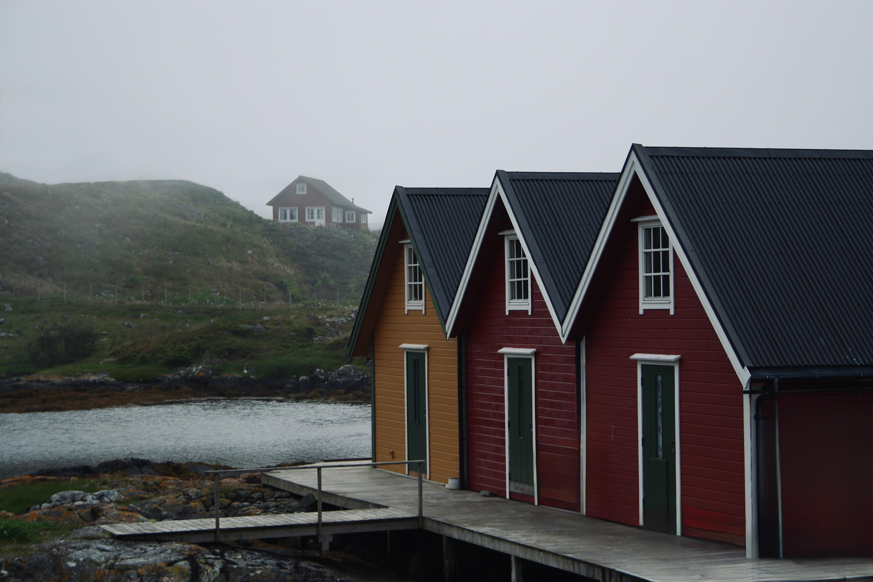 Harbour with boats at Rongevær in the mist